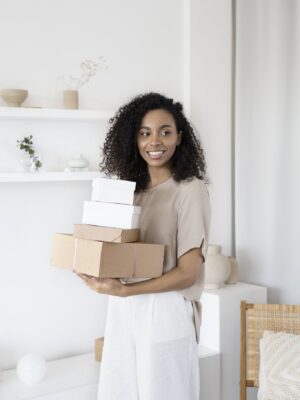 A Woman Holding Cardboard Boxes