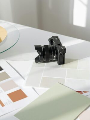 Black Dslr Camera on White Table